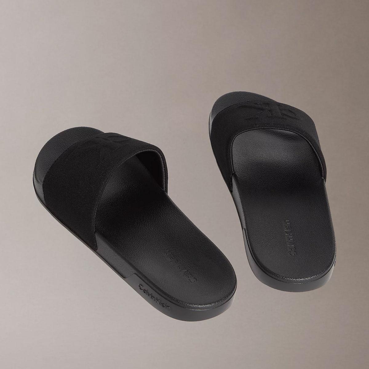 Ciabatte Calvin Klein con logo in tela da uomo rif. HM0HM02109