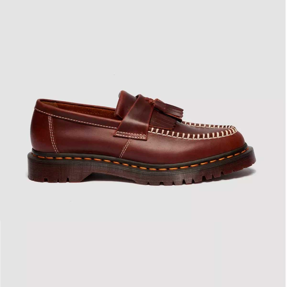 Scarpe Mocassini Dr. Martens Adrian Tassel in pelle Orleans da Uomo rif. 42849200