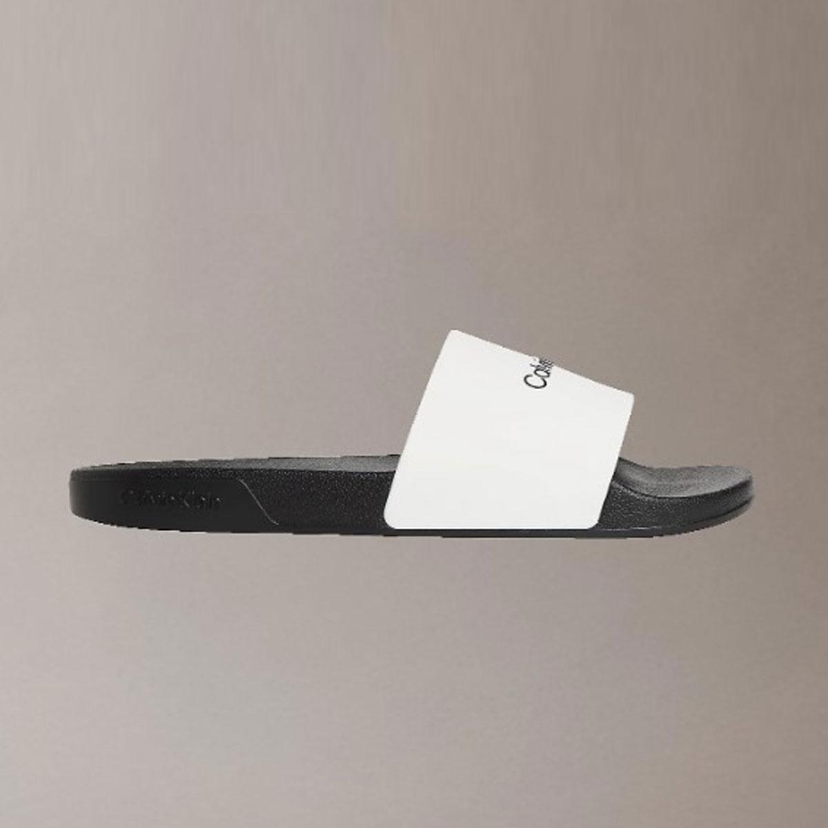 Ciabatte Calvin Klein con logo in tela da uomo rif. HM0HM02107