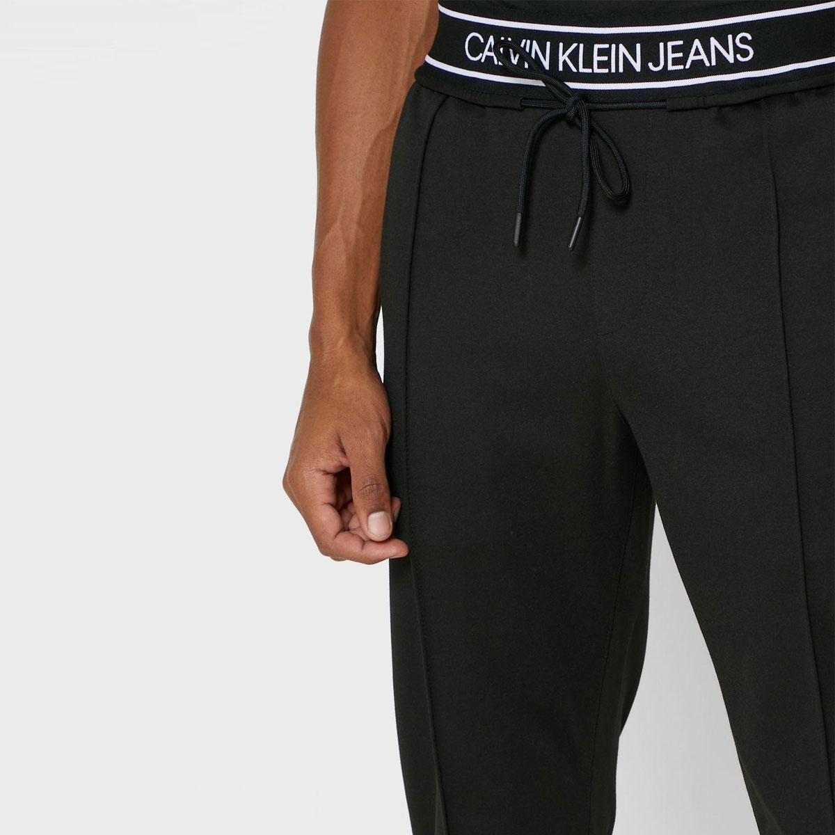 PANTALONI CALVIN KLEIN Jeans logo tape da uomo rif. J30J315657 EUR 89,90 -  PicClick IT