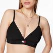 Top Tommy Jeans Bralette A Coste Con Distintivo da donna rif. DW0DW15305